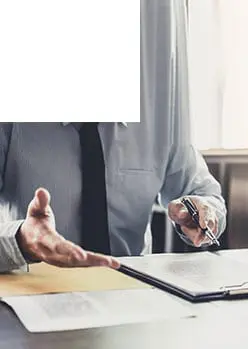 Image of professional discussing commodity valuation and risk analytics solutions