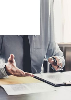 Image of professional discussing commodity valuation and risk analytics solutions
