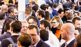 Image of people at E-World - Europe's largest trade fair representing Lacima's dedication to global energy and commodities valuation, optimisation and risk management