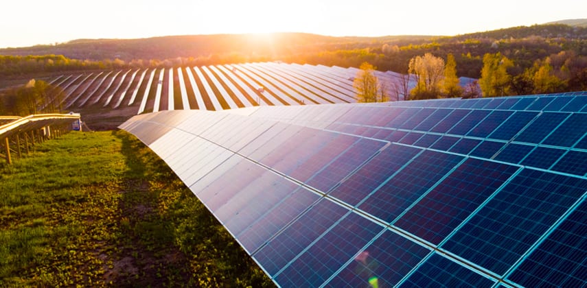 Image of solar panels at sunset to represent Lacima's relationships with Canadian Solar